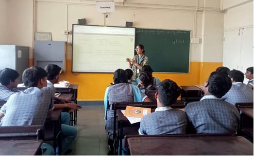 Grade X students in a session with an IEC facilitator at Guru Nanak Mission High School
